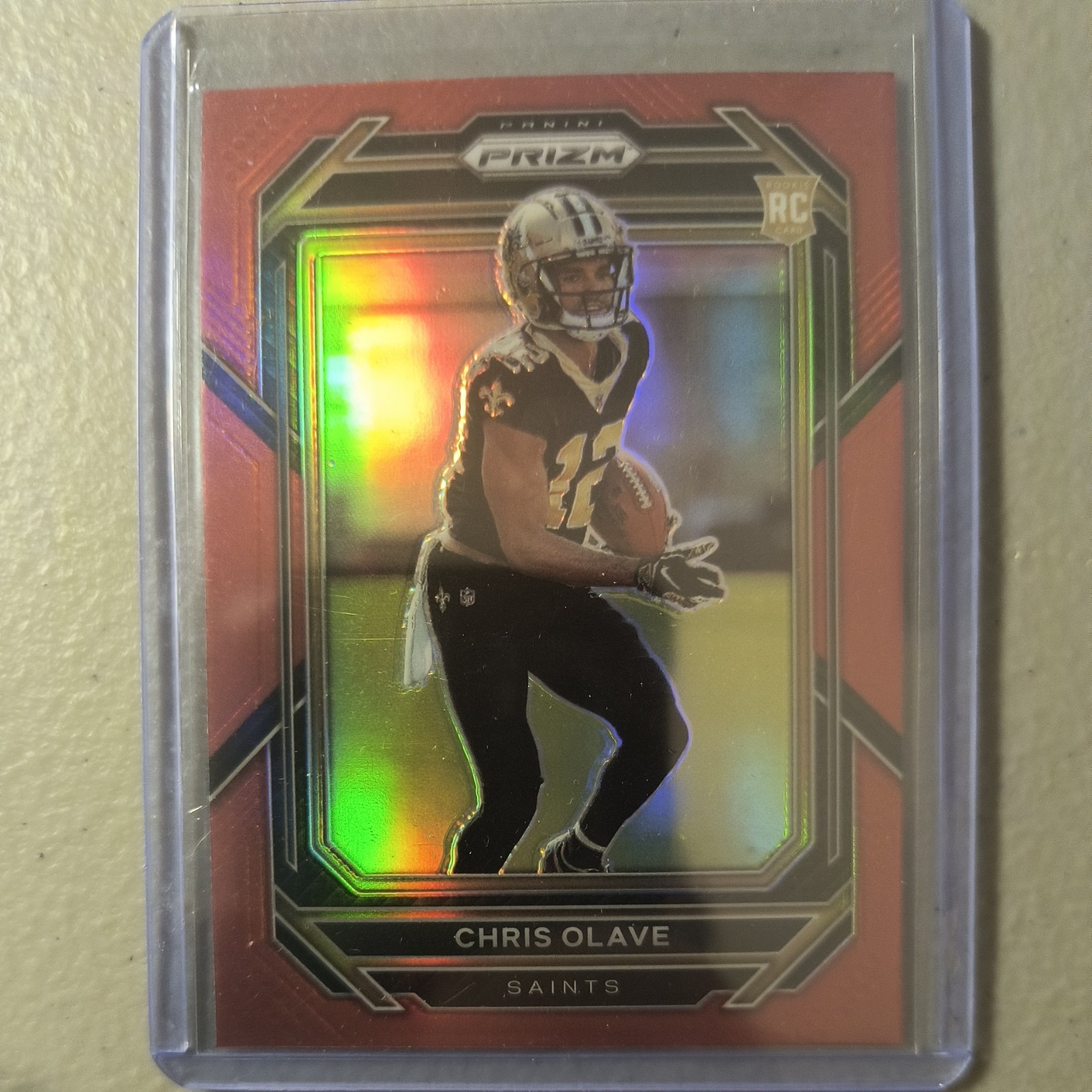 2022 Panini Prizm - Rookies Chris Olave #310 Red Retail Prizm SSP (RC)