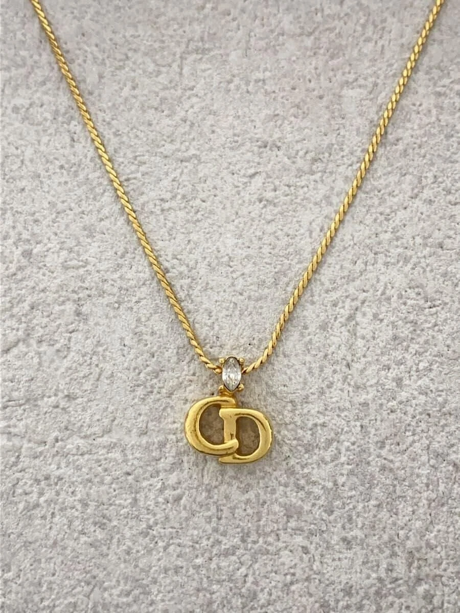 Collier pierre Christian Dior    Haut doré pour femme