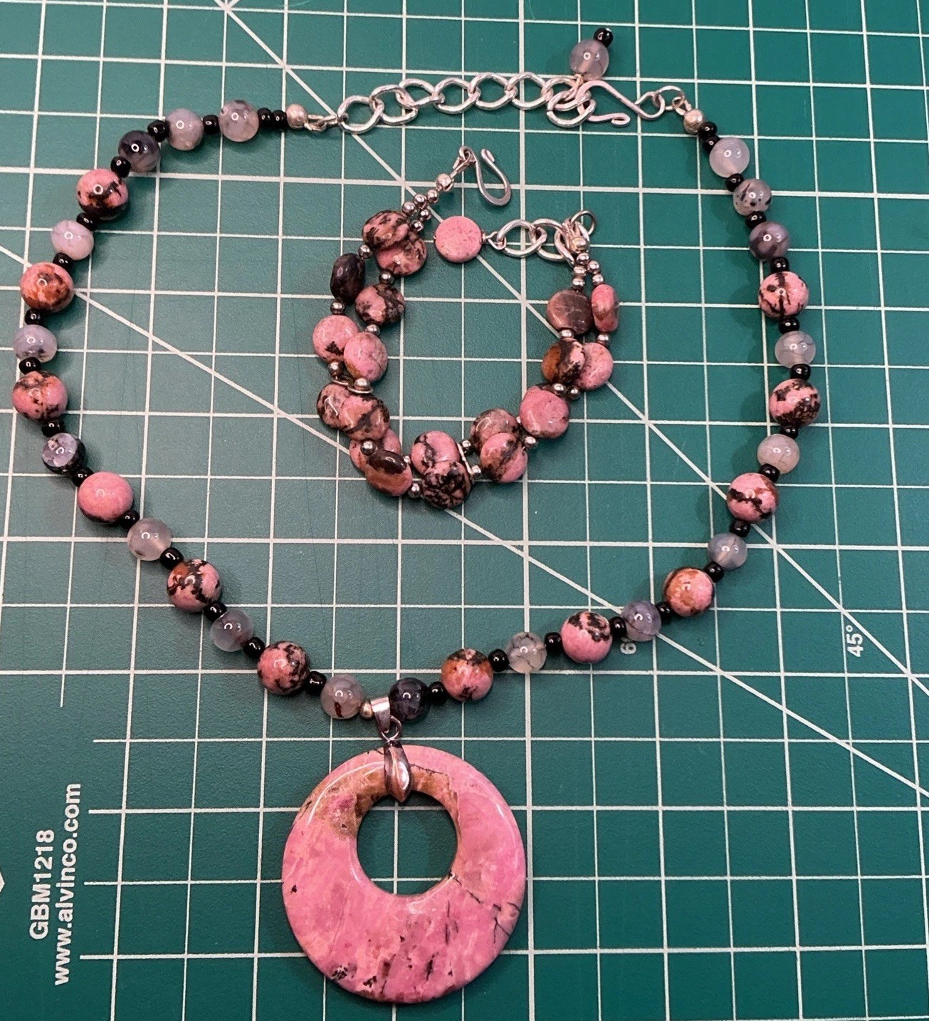 handcrafted Rhodonite Stone necklace large Donut pendant Matching Bracelet