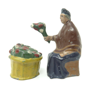 CHARBENS BLUMENVERKÄUFER MIT KORB