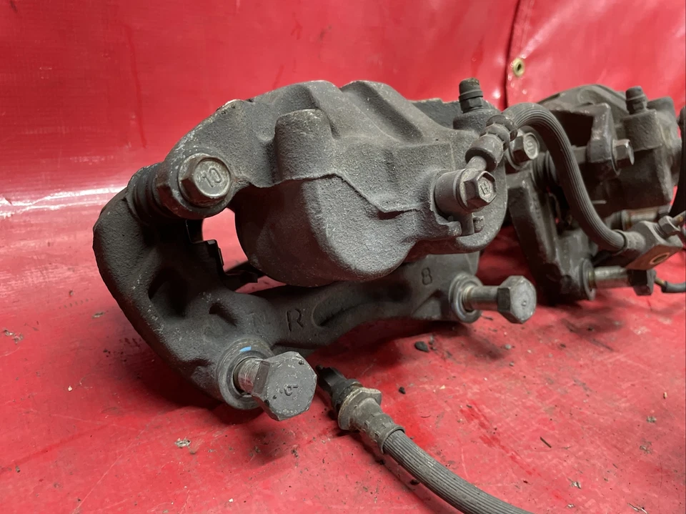 Juego de pares de pinzas de freno delanteras derecha izquierda Infiniti M35 2006 tracción trasera OEM #2 Foto 4 de 4