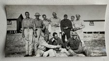 WWII B W Photograph Group Of Soldiers Standing Sitting Barracks k