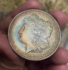 Rainbow Toned 1888-O Silver Morgan Dollar