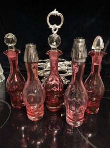 Antique Cruet 5 Condiment Set Thumbprint Cranbery Glass Bottles Cast Metal Caddy