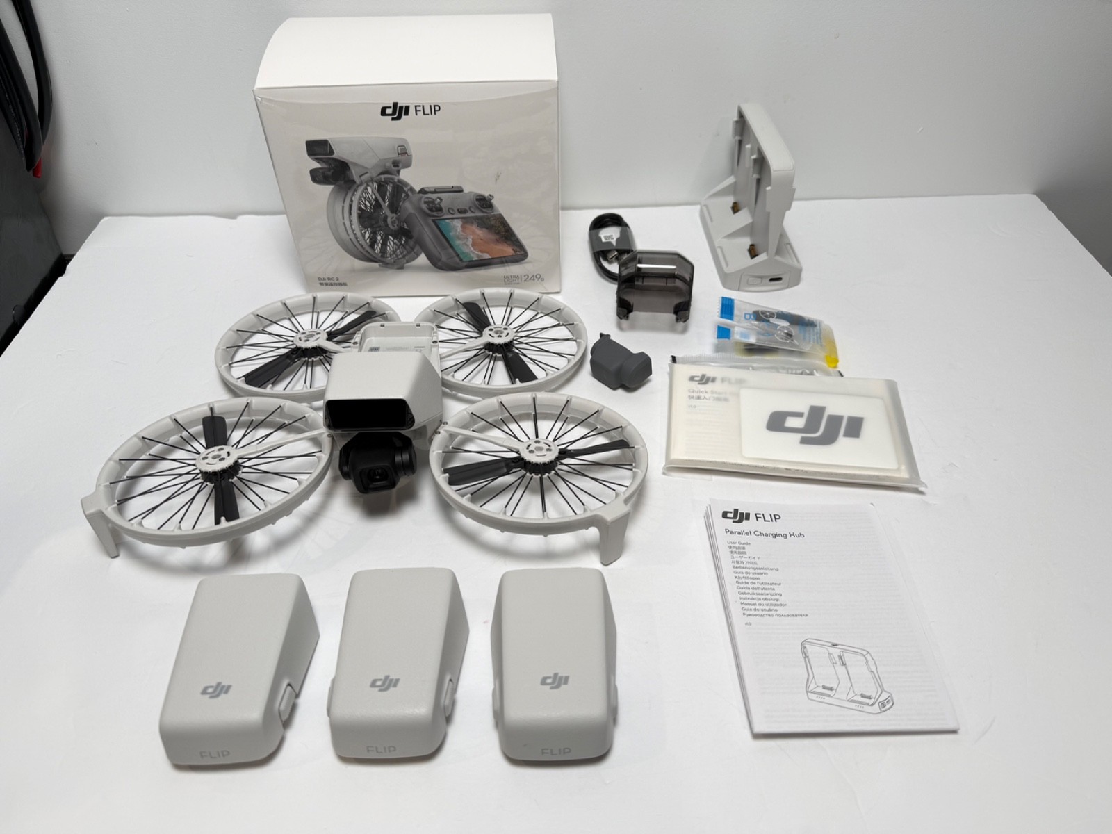DJI Flip Drone w/ 3 Batteries + Charging Hub –Excellent -Unbound –NO Controller-image
