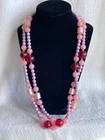 Vintage plastic bead costume jewelry necklace, shades of pink colors 52 inches
