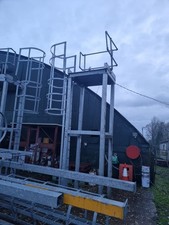 Fire escape staircases with cat ladders and platform