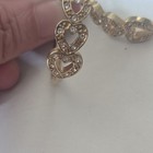 Vintage  Stamped NA Gold Tone Hoop Triple Heart Omega Back Earrings Avon — photo 3
