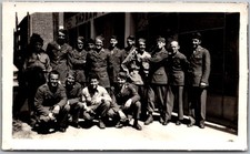 Vtg Snapshot WWII Soldiers Group Portrait Uniforms Military Men Caps 1940s