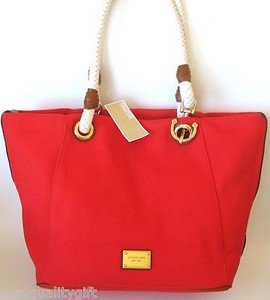 red and brown michael kors purse