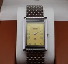 Vintage Seiko Slim Quartz Men's Wrist Watch Yellow Dial with Silver Bracelet.