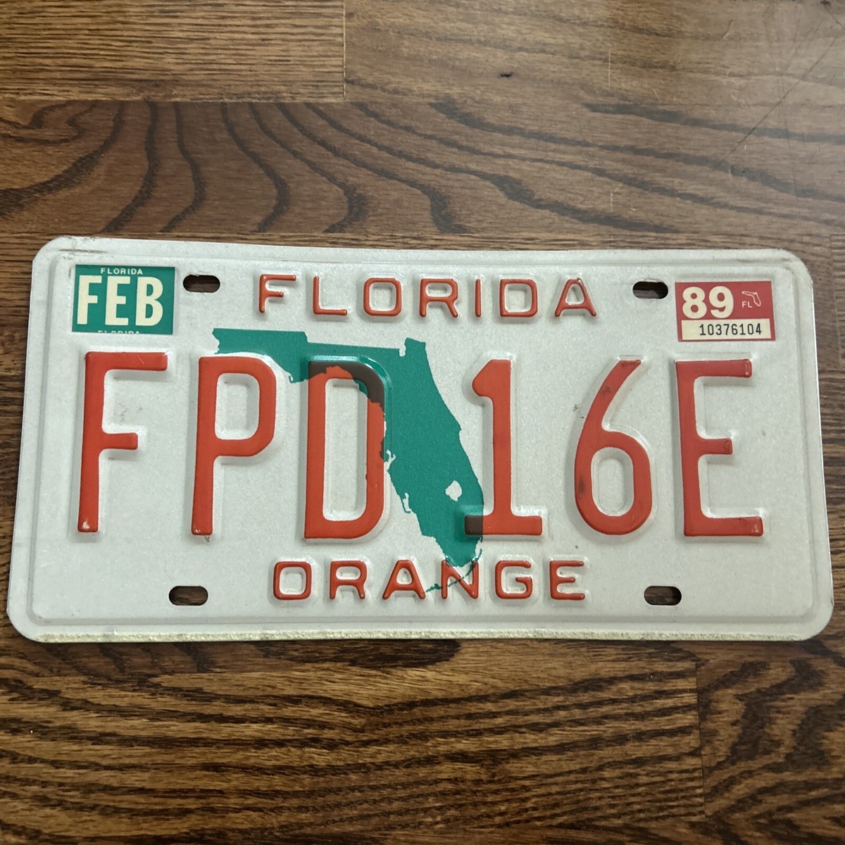 1989 Florida License Plate FPD 16E Orange on White Broward Expired