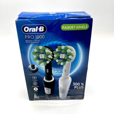 Pre Owned Oral-B Pro 1000 Twin Pack Rechargeable Toothbrush - Black And White