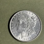 1885 $1 Morgan Silver Dollar Au/Bu Slider