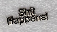 Shit happens pin badge. Black and silver design. Metal. Enamel. Well it does
