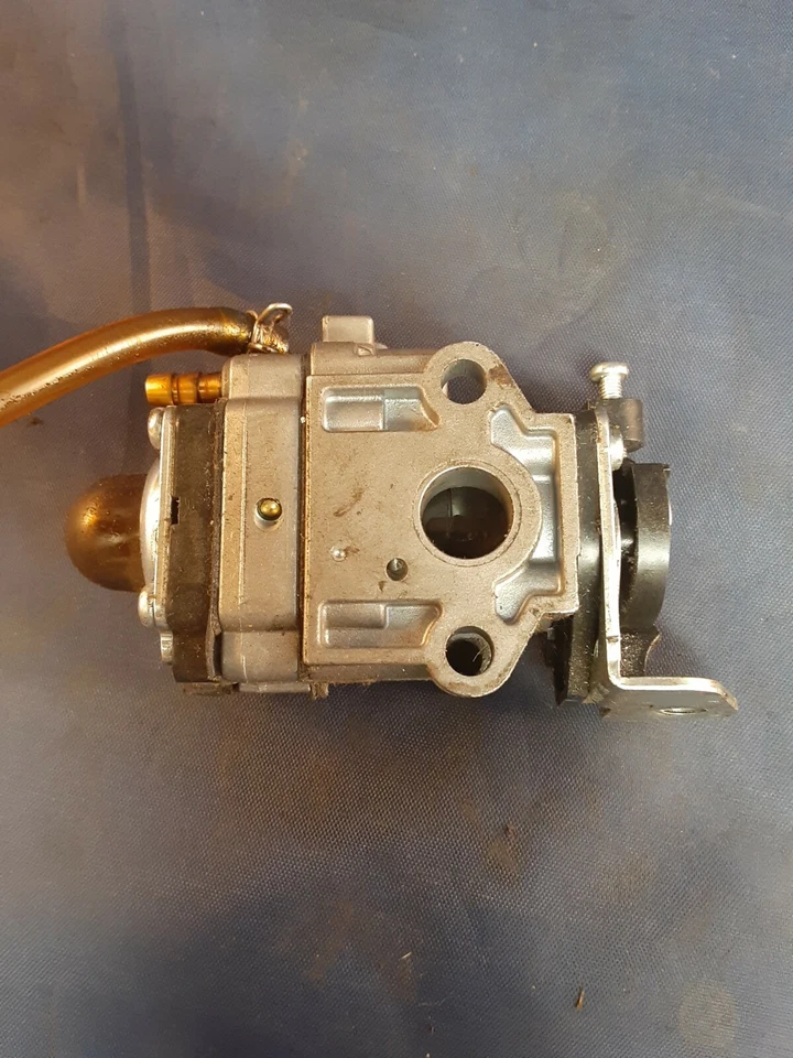 Parte de montaje de carburador Shindaiwa Trimmer T242 S242E A021002070, 62100-81010 Foto 2 de 4