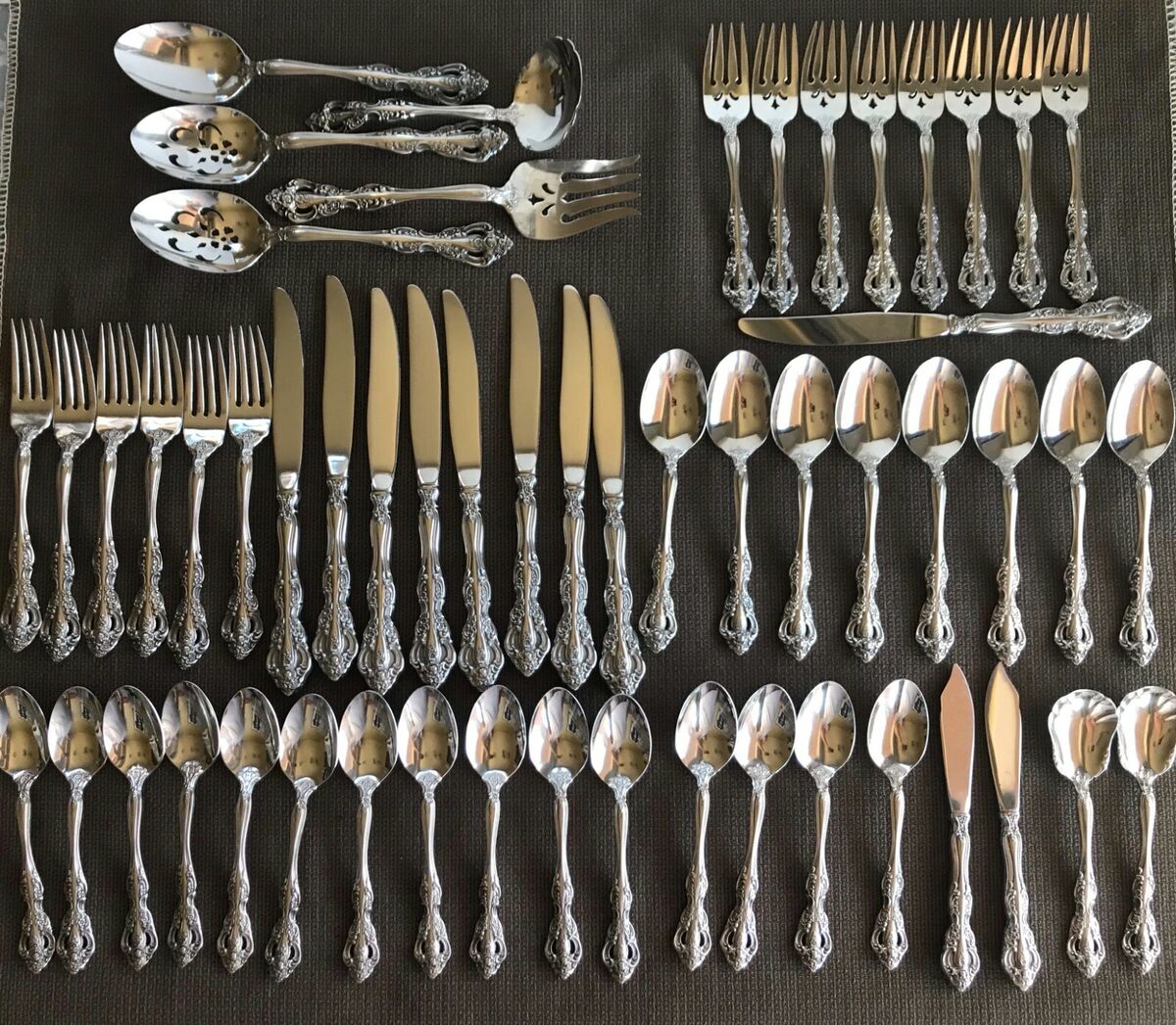 54 pc Oneida MICHELANGELO Cube mark STAINLESS FLATWARE 54 pc Oneida MICHELANGELO Cube mark STAINLESS FLATWARE