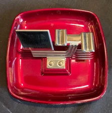 Mid Centry ashtray in hot red with advertising never used