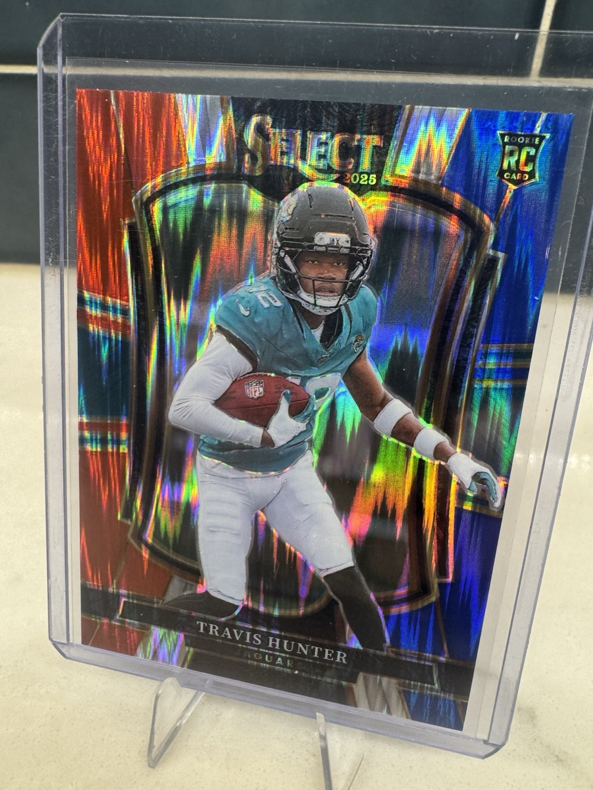 2025 Panini Select Travis Hunter RC Premier Level Red And Blue Shock Prizm #128