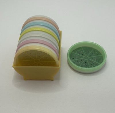 Tupperware Pastel set of 7 Wagon Wheel Coasters With Caddy Rack Holder Vintage