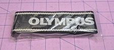 NEW Olympus Black and Silver Genuine Camera Neck Strap, 1.5 inch wide