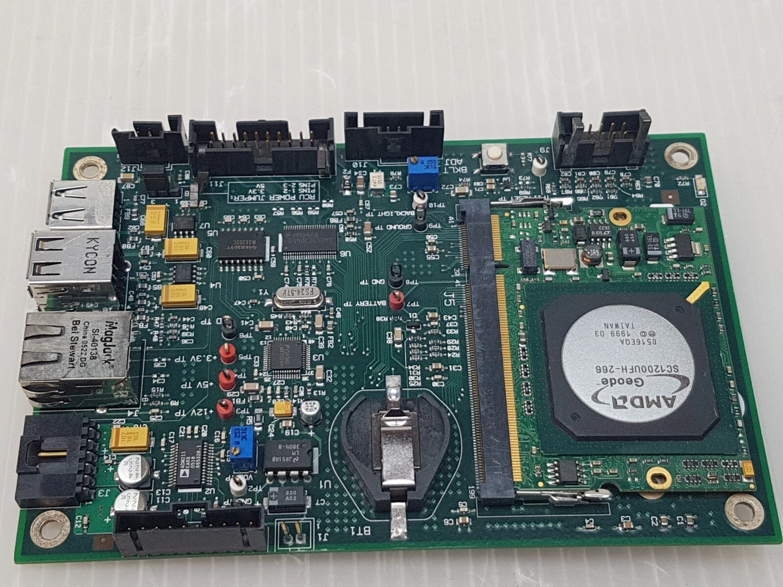 Kontron 700-176 board from an angle showing USB, Ethernet jack and Geode module