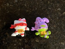 Lot of 2 McDonalds Hello Kitty Happy meal toys TMNT Teenage Mutant ninja turtles