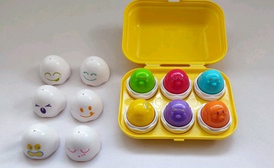 TOMY Versteck und Quietscheier Aktivitätsspielzeug (E1581)
