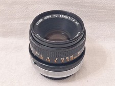 Canon FD 50mm F/1.8 S.C. Lens Made In Japan Moves Freely Light Used Marks