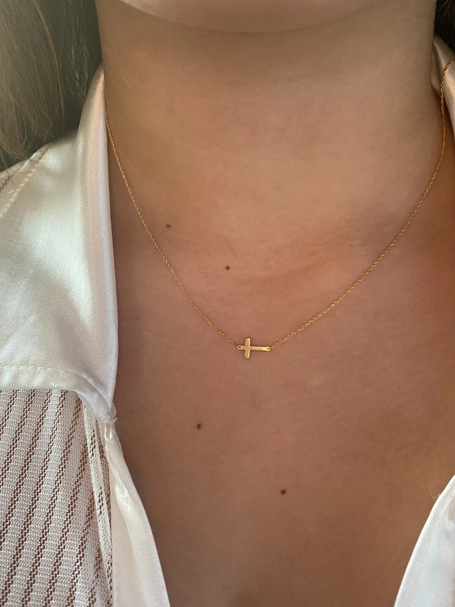 Sideways crucifix necklace deals