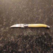 Petit couteau en inox Laguiole "l'éclair" à manche jaune long. 13,5 cm