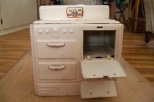 "Pretty Maid" tin toy stove from mid-1900s