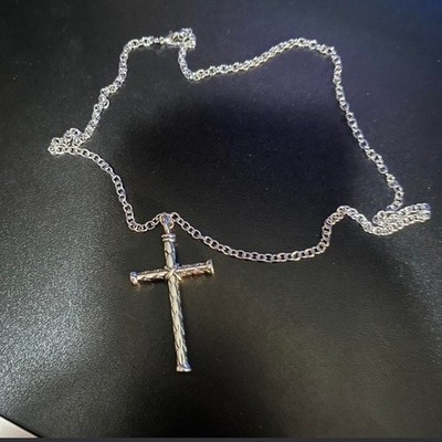 23 1/2 inch Silver cross necklace, with some weight to it and removable piece