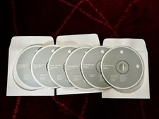 Apple iMac OS X Install Disc 1  2 Version 10.2, 2002, Plus 4 recovery discs.