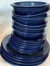 Fiesta 4 Plates 6 Bowls 8 Saucers 7 Tea cups 8 Saucers Cream Sugar Salt Pepper