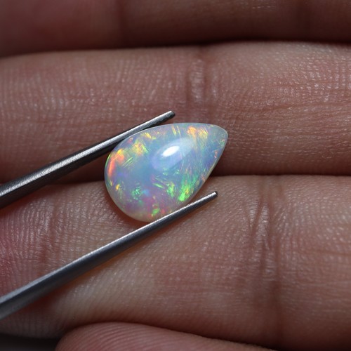 2.5 Cts 14.1x9.6 MM Natural AAA Flashy Multi Fire Ethiopian Opal Pear Cabochon - Picture 4 of 9