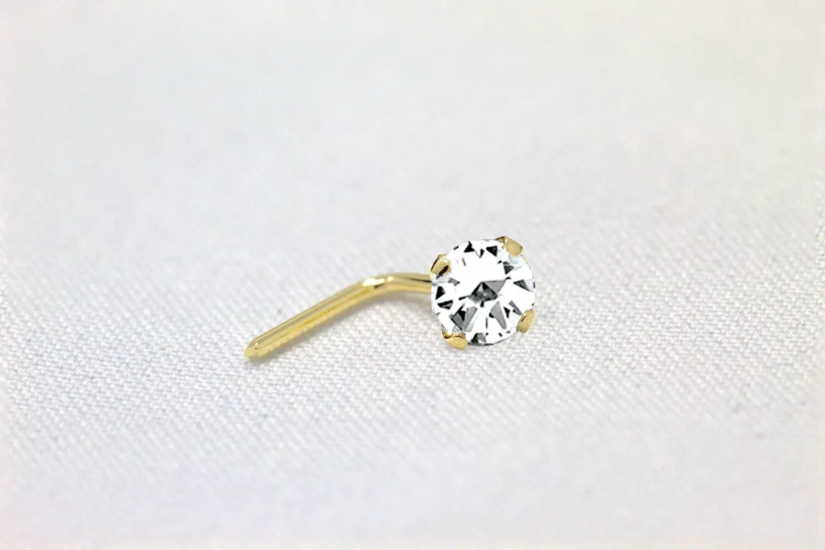Tiny flat gold shop nose stud