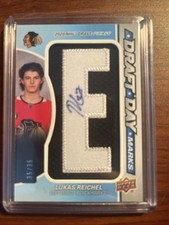 2022-23 SP Game Used #DDM-RE Lukas Reichel Draft Day Marks Rookies 