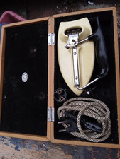 VINTAGE HMV  FOLDING IRON WITH CASE, LEAD AND LIGHT FITTING ADAPTER.