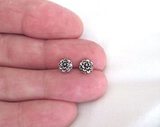 Sterling Silver 6mm Flowers post stud earrings.
