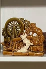 Vintage McCoy Pottery Planter Spinning Wheel, Brown, 1950’s, no cracks or chips.