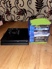 Sony PlayStation 4 Slim 500gb 1 Wireless Dualshock Genuine. Lots of great games.