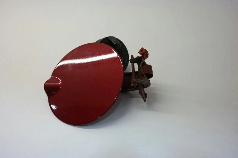 Dodge Grand Caravan 2008-2010 puerta de llenado de combustible roja Foto 2 de 4