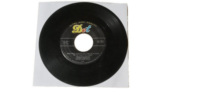 ''DOES YOUR CHEWING GUM LOSE IT'S FLAVOR......''     Lonnie Donegan         Dot 45