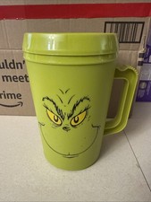 "The Grinch" plastic jumbo tumbler, often referred to as a Grinch Guzzler, Used