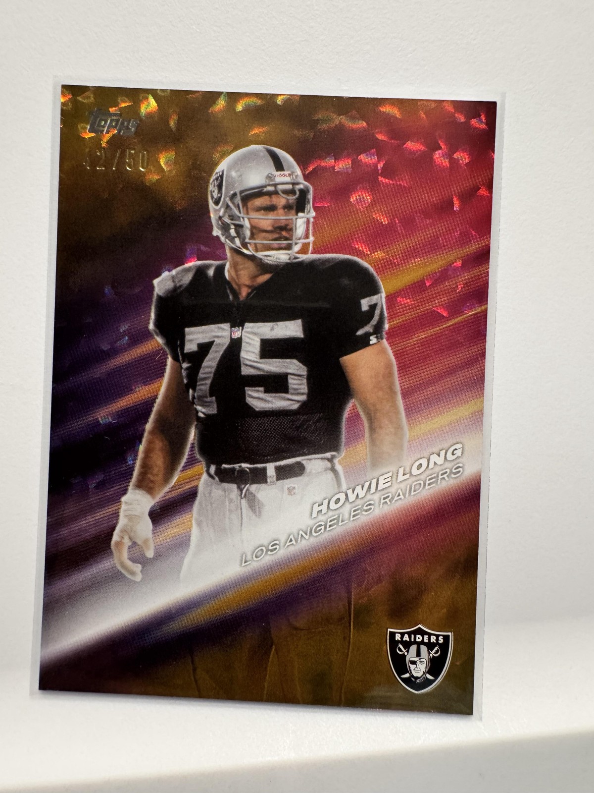 2026 Topps Flagship #GOTG-23 Howie Long Greats of the Game Gold #/50
