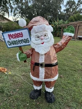 Home Accents Holiday 5 Ft. LED Santa Merry Christmas Outside Yard Decoration.