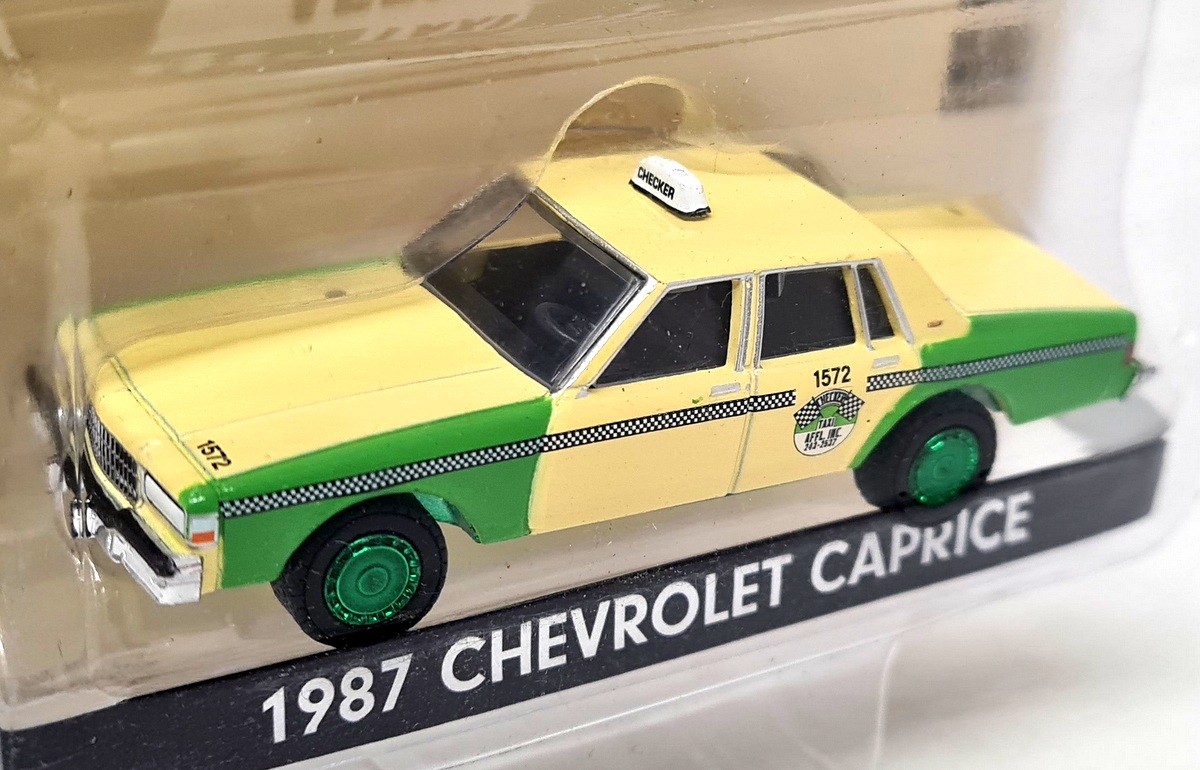Greenlight 1/64 - Chevrolet Caprice 1987 Taxi Green Wheel Chase Model Car