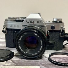 Canon AE-1 SLR 35mm Film Camera w/ Canon Lens FD 50mm F1.8 From Japan
