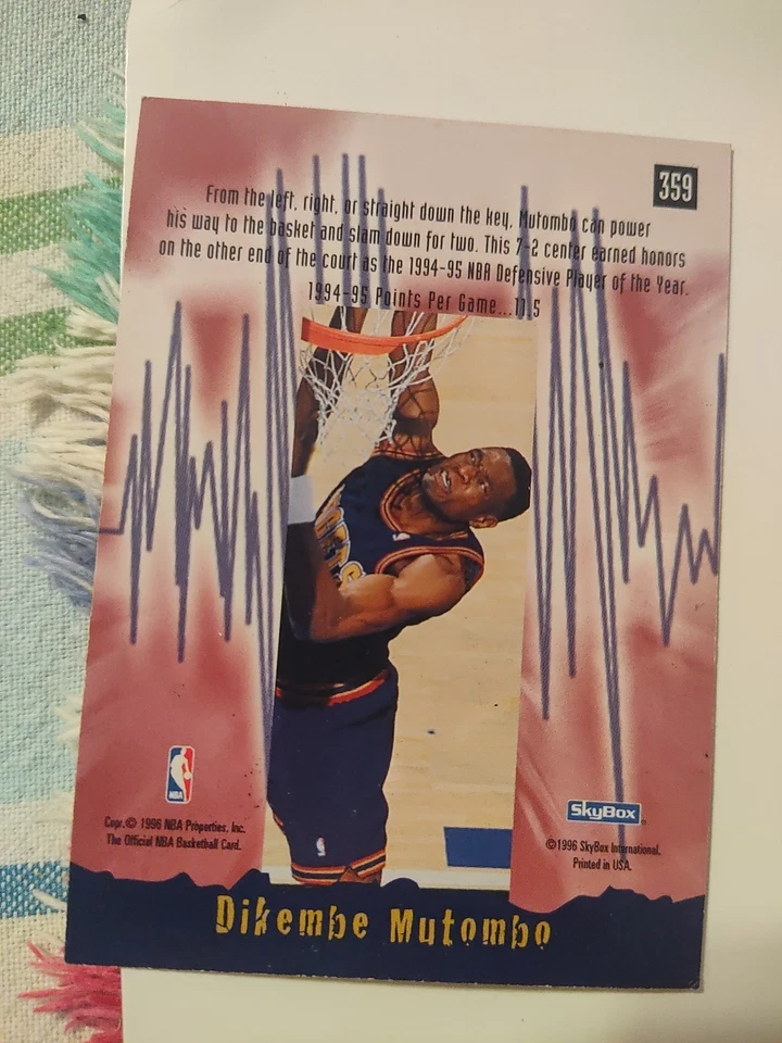 Tarjetas de baloncesto Dikembe Mutumbo (17 unidades) Topps Upper Deck NBA Hoops 1995-1996 Foto 3 de 4